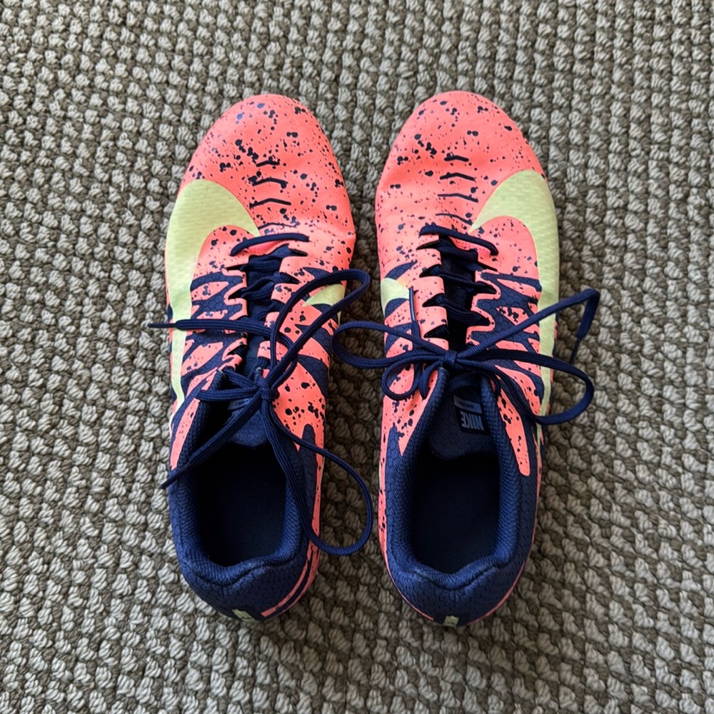Nike track shoes, size 10.